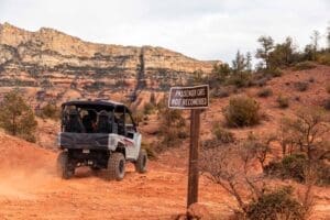 4-seater atv rental off-roading through rough Red rocks of Sedona Arizona