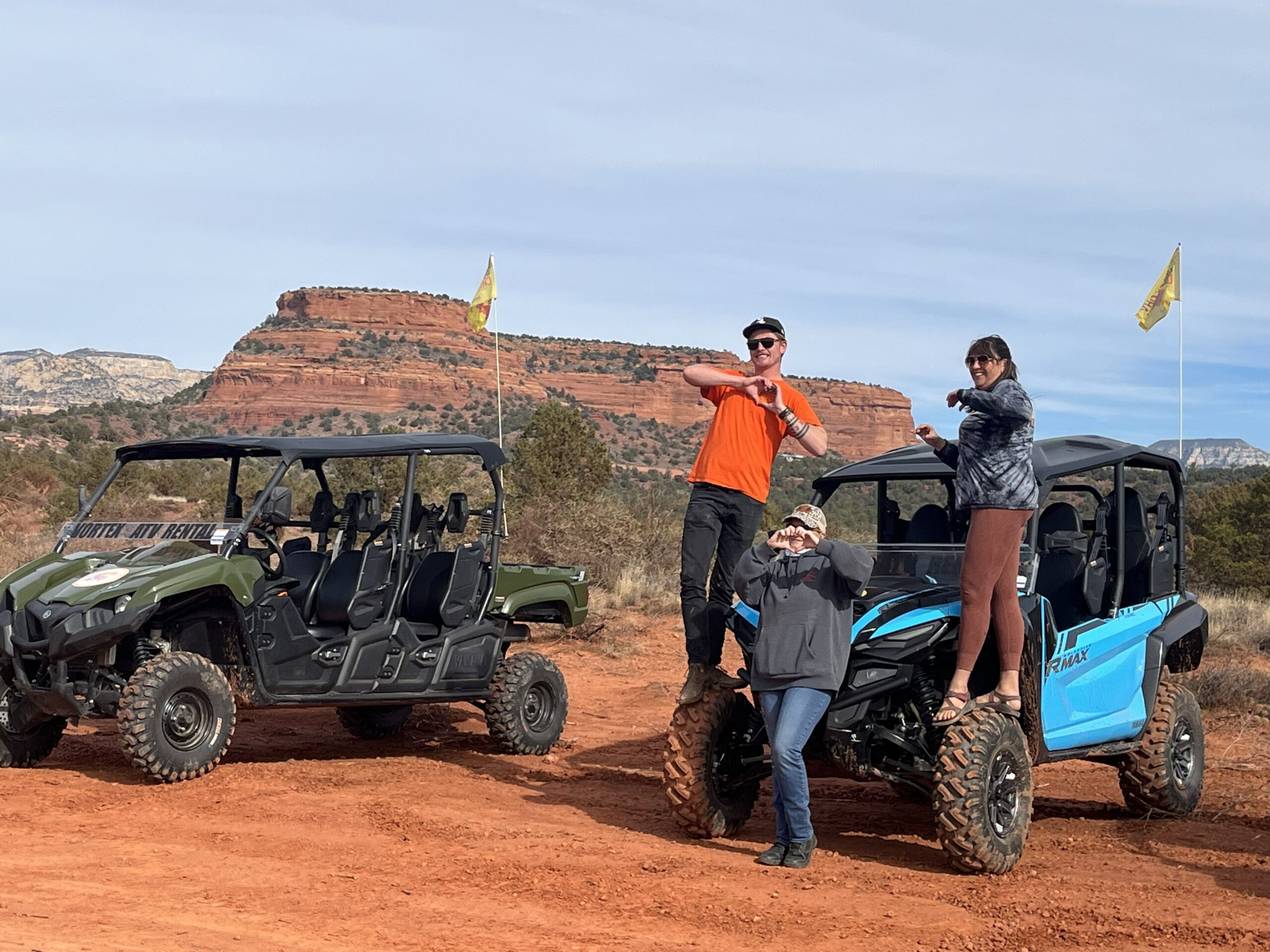 People posing on sedona ATV rentals with beautiful smiles